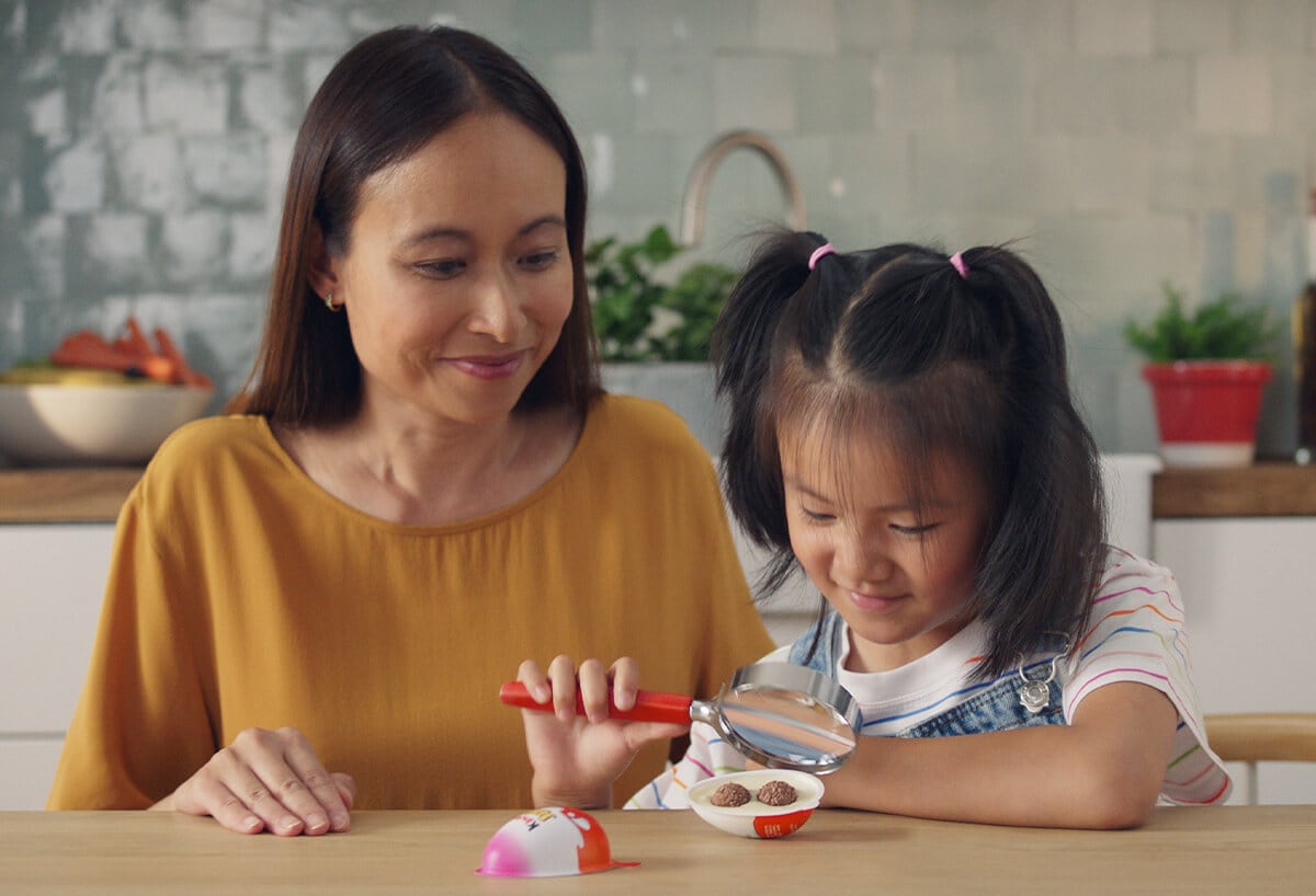 Young girl with magnifying glass