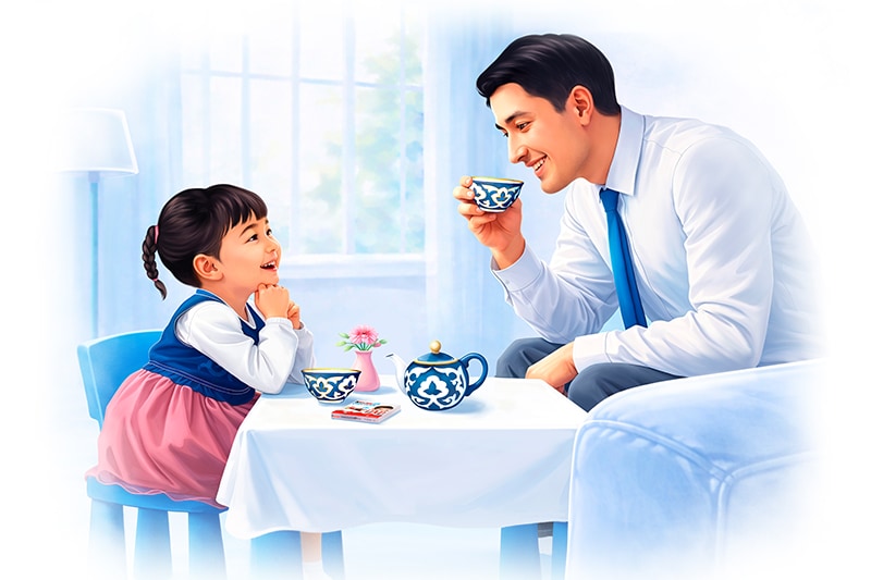 Father and daughter drinking a tea