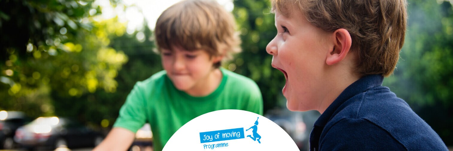 Two boys playing JoM